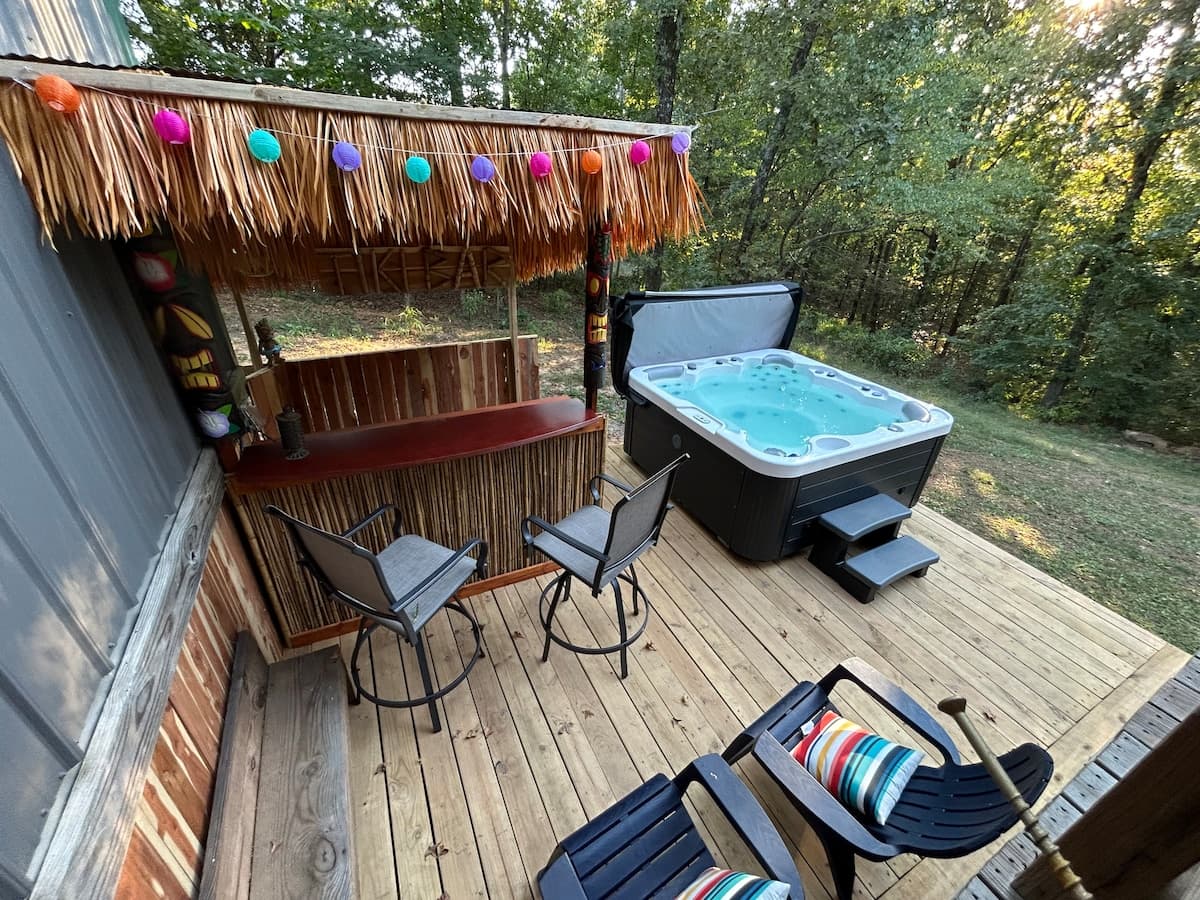 Private hot tub and tiki bar on the deck at Dorinda Sue's Getaway
